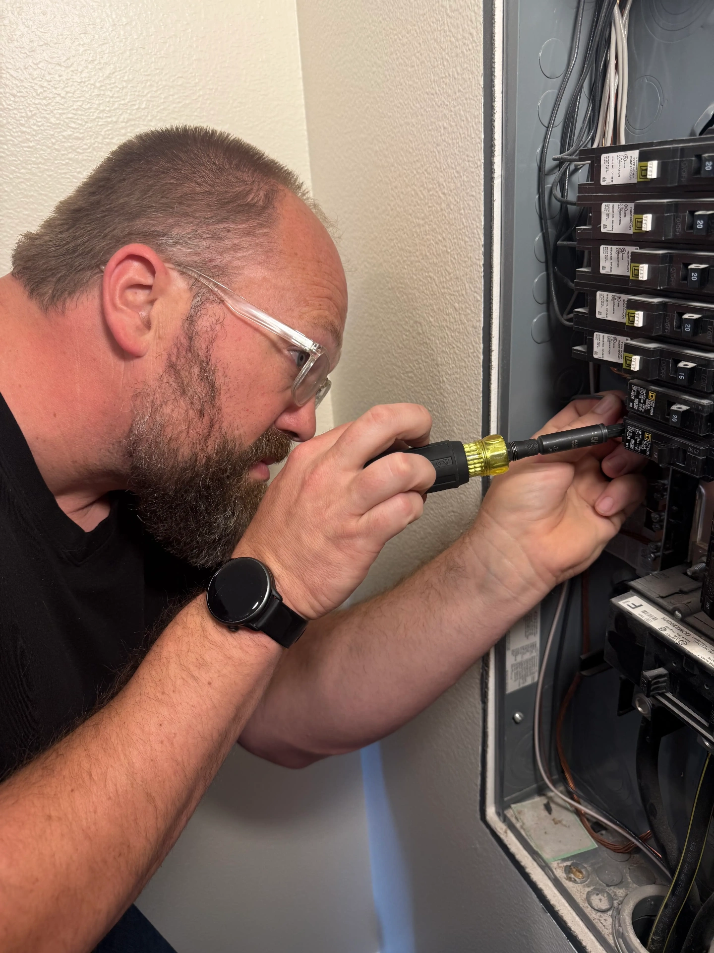 Tanner Smart — Licensed Electrician at SmartEST performing panel work in Pierce County WA